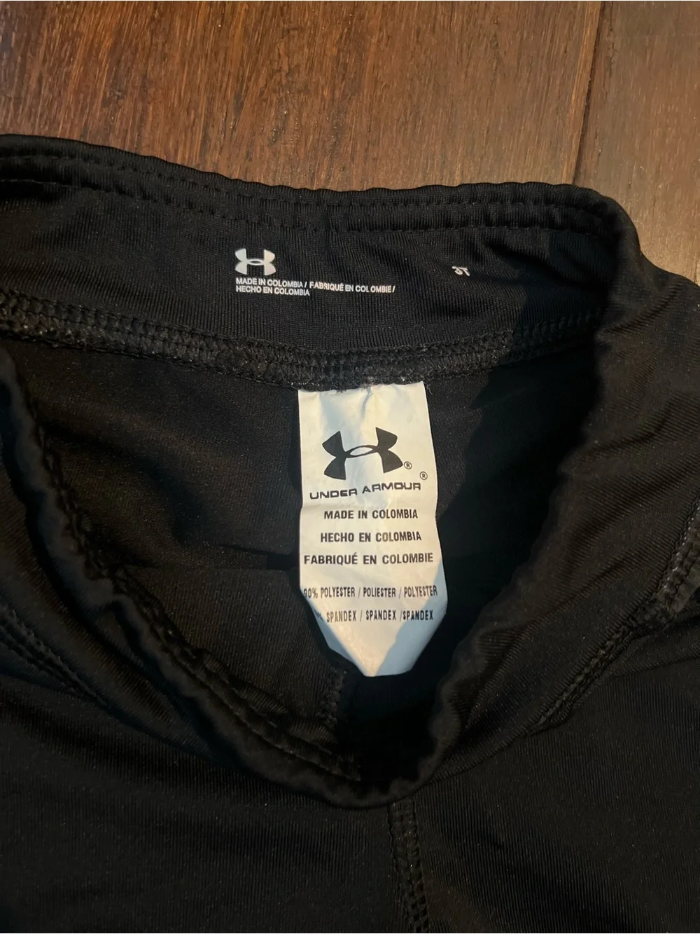Under Armour Black Leggings with Gray, White & Pink Side Panels